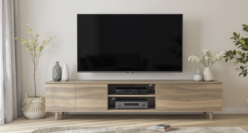 Modern TV entertainment unit with flat screen TV and organised electronics